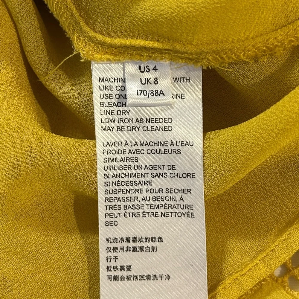 Anthropologie clementine Ruffled eyelet Blouse in vibrant mustard yellow size 4